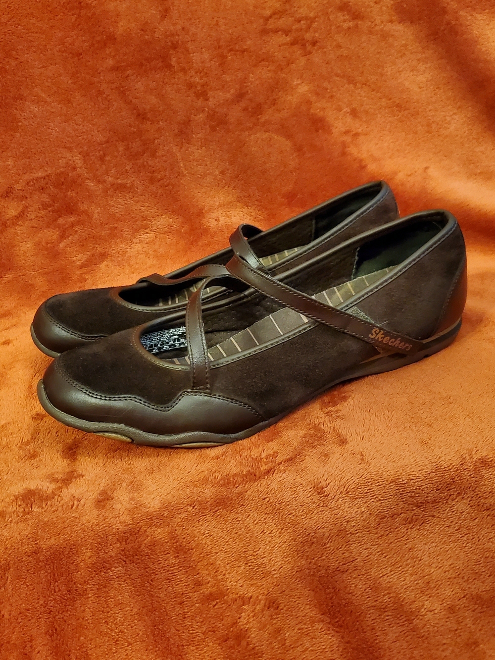 Skechers Womens Dark Brown Suede and Leather Mary Jane flats.